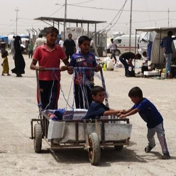 Soaring temperatures pose new threat to Mosul’s displaced – UN migration agency