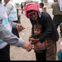  Aid - Displaced amid Mosul offensive, close to 10,000 children in urgent need of aid, says UNICEF