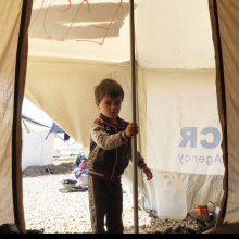  mosul - UN agency expanding camps around Mosul to cope with surge in displacement [This three-year-old boy arrived just two days ago at one of UNHCR’s camps for displaced families fleeing conflict in West Mosul. Photo: UNHCR/Caroline Gluck]
